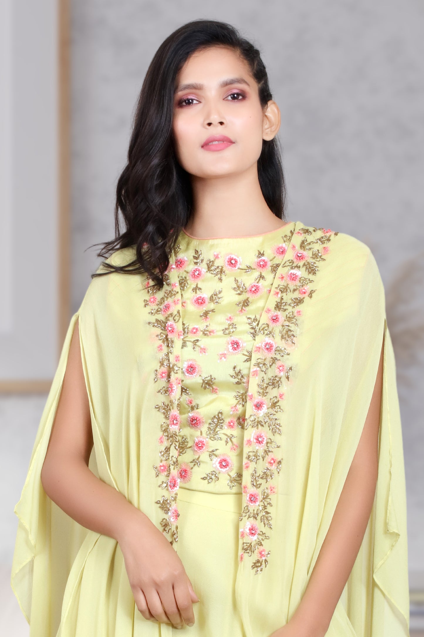 CAPE WITH THREE LAYERED SKIRT