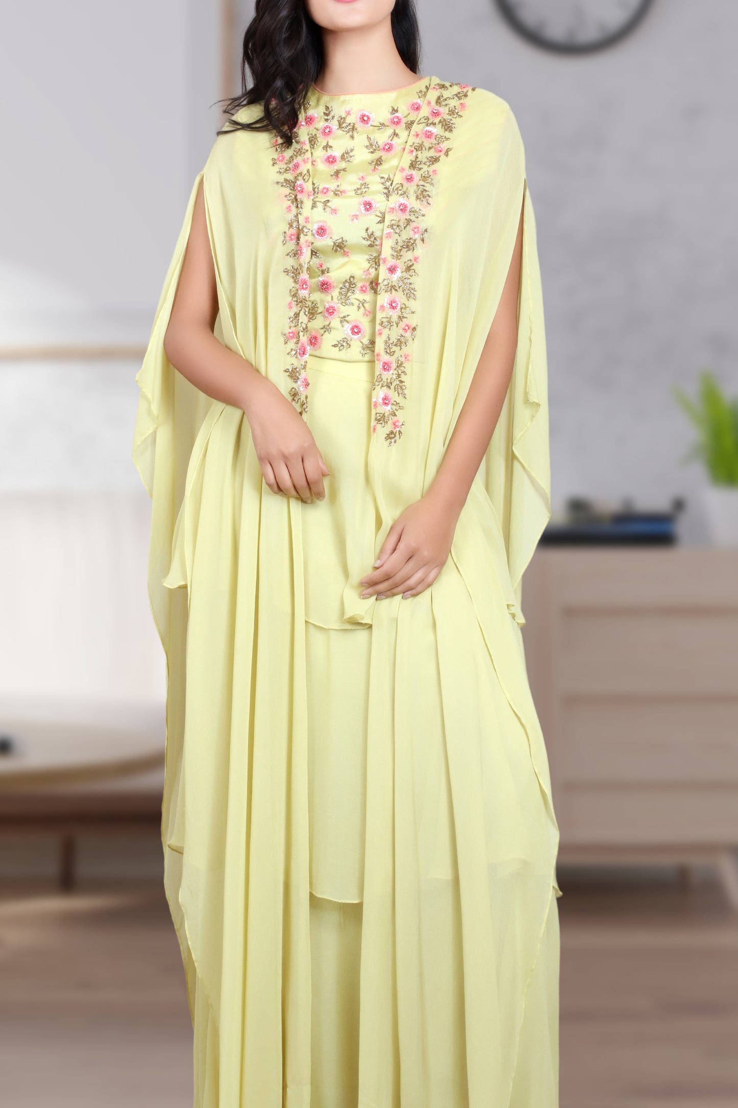 CAPE WITH THREE LAYERED SKIRT