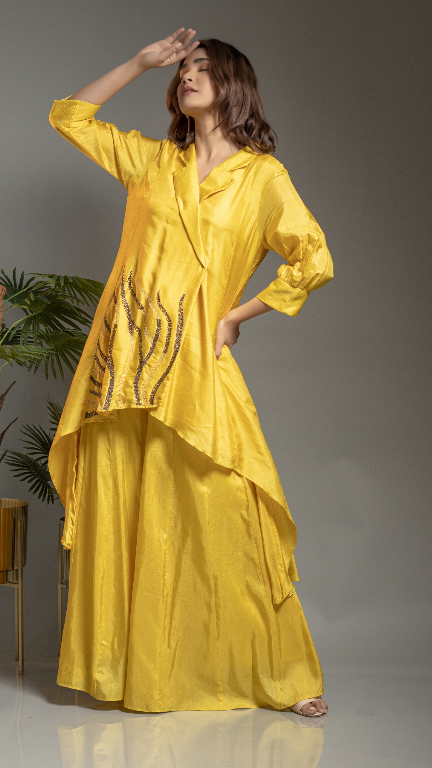 FLAIRED PANTS WITH ASYMMETRIC TUNIC