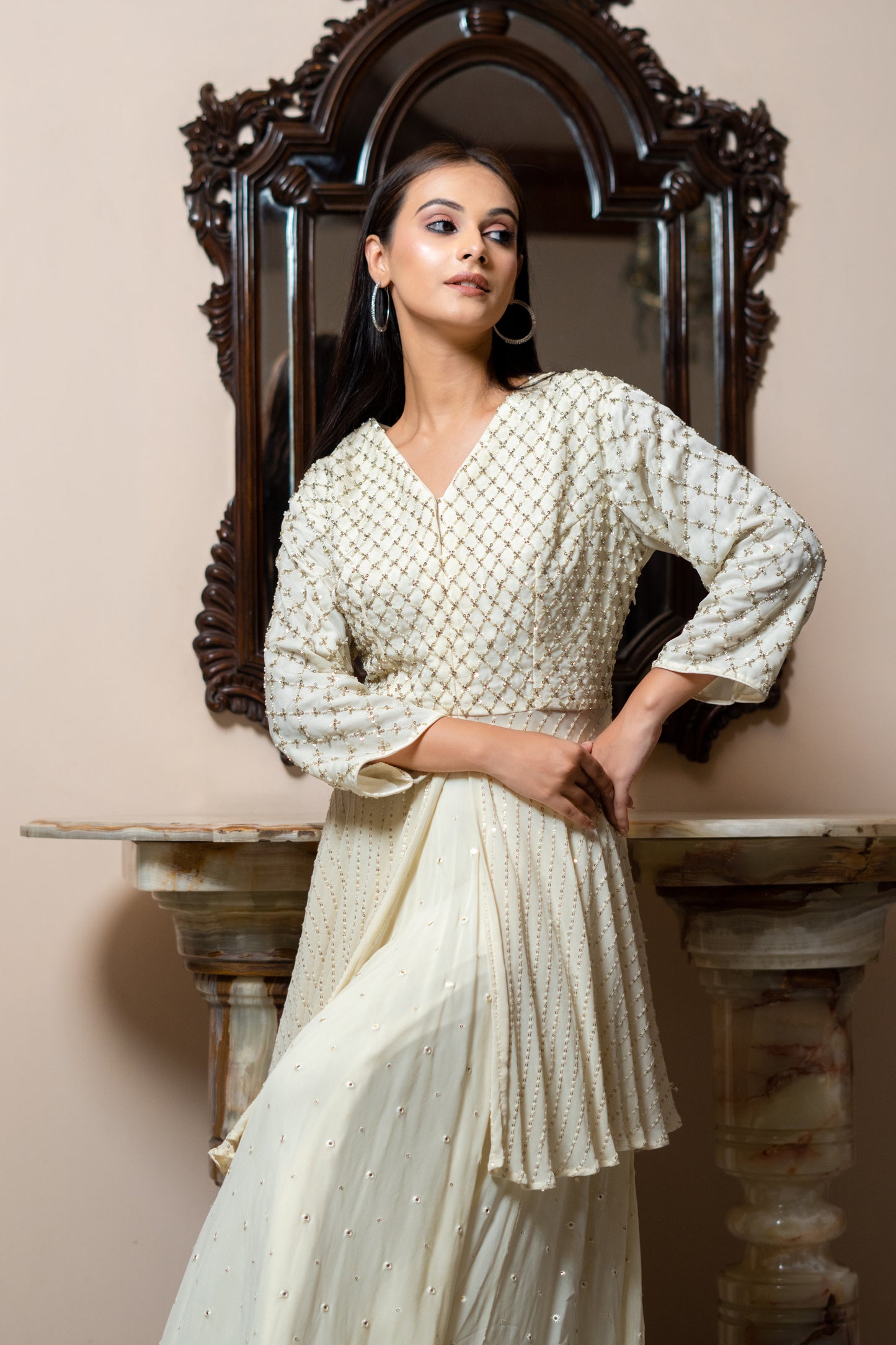IVORY PEPLIM BLOUSE WITH TEXTURE LEHENGA