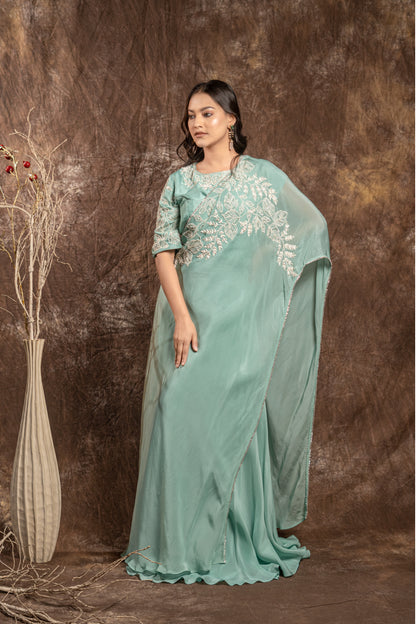 ONE SHOULDER CAPE WITH SKIRT WITH BLOUSE