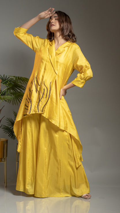 FLAIRED PANTS WITH ASYMMETRIC TUNIC