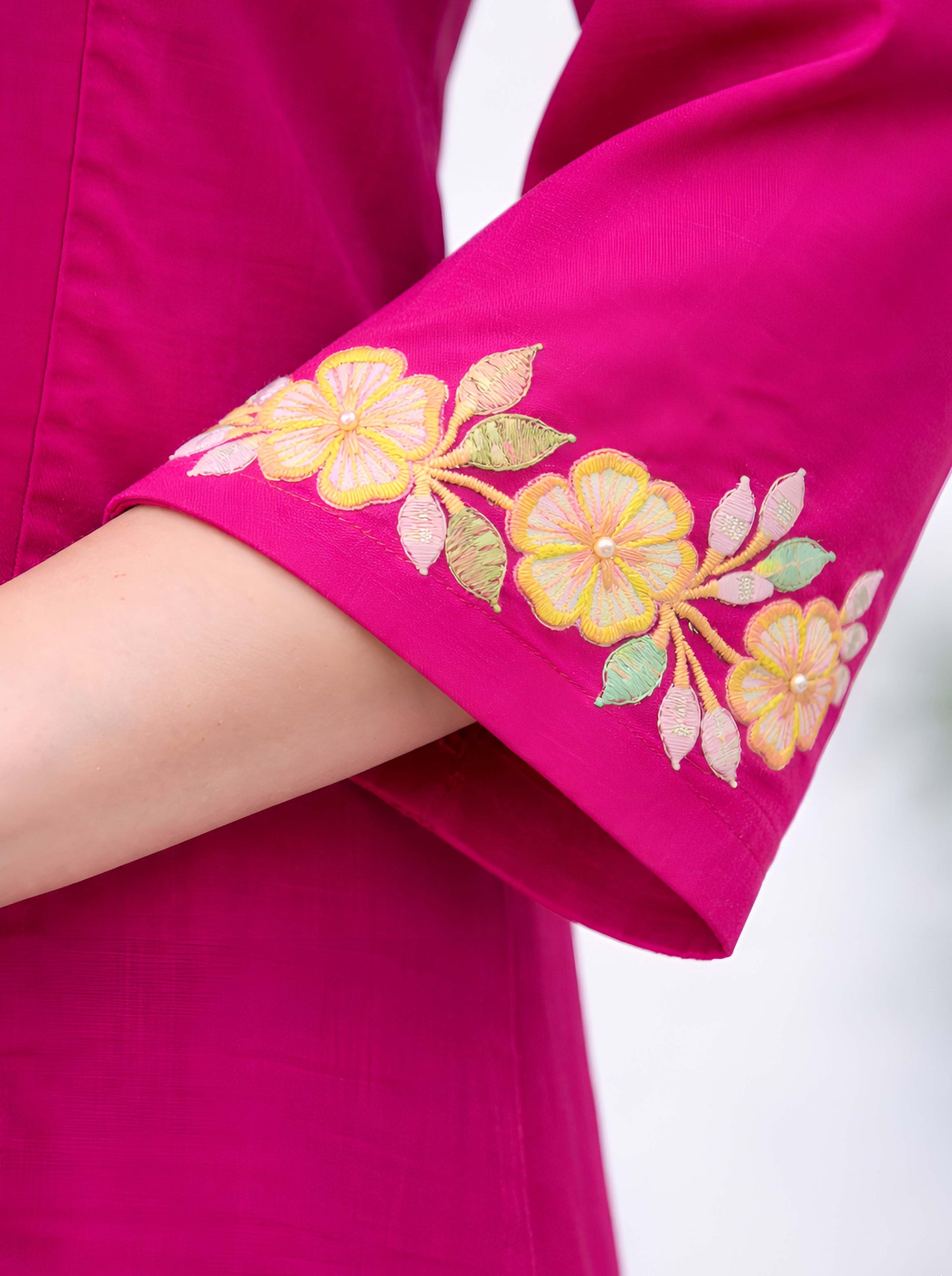 RANI TAIL CUT TUNIC WITH MACHINE EMBROIDERY NECKLINE