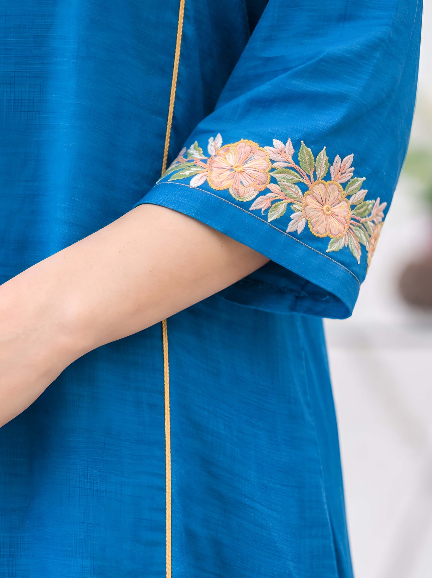 BLUE TAIL CUT TUNIC WITH MACHINE EMBROIDERY NECKLINE